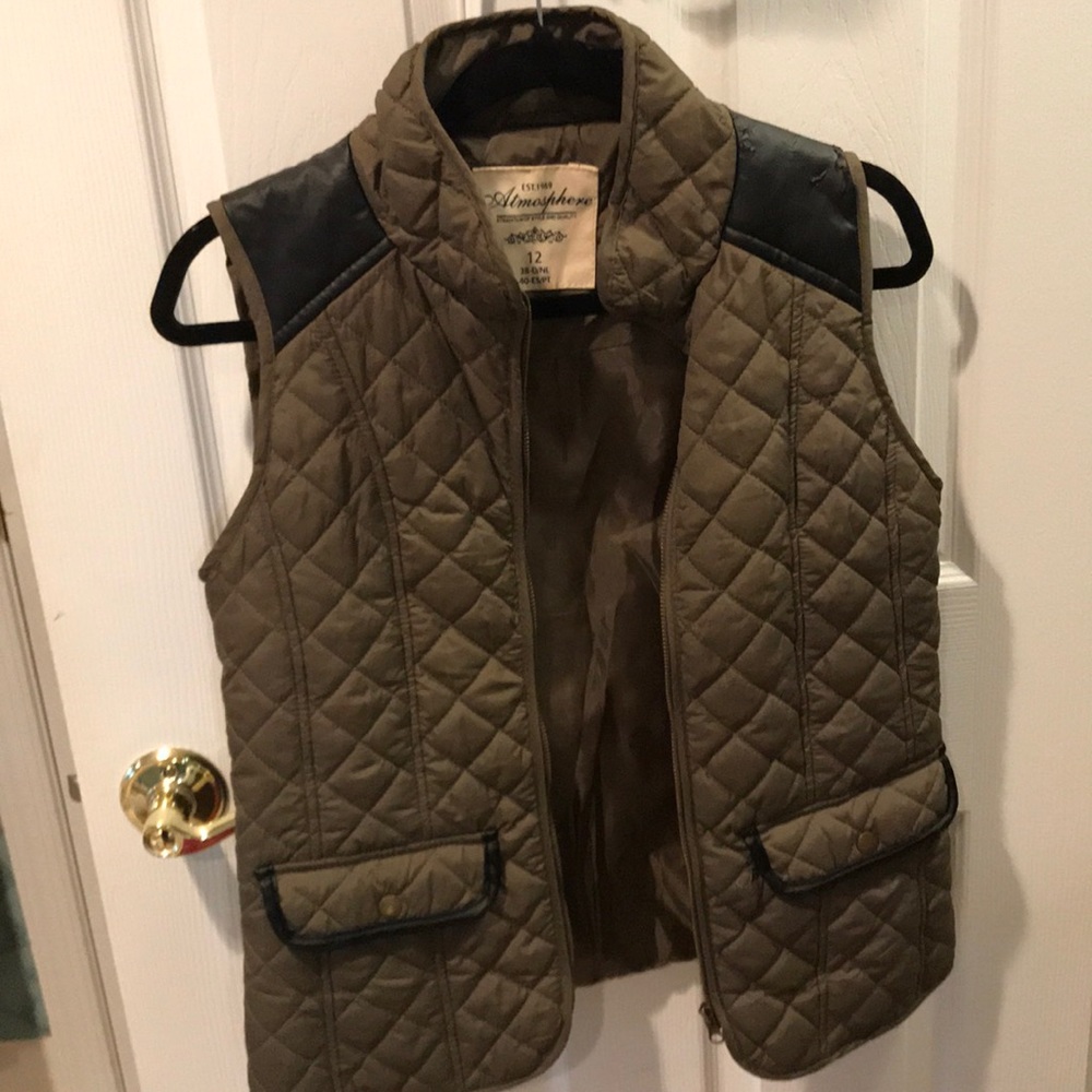 Green vest with black detailing